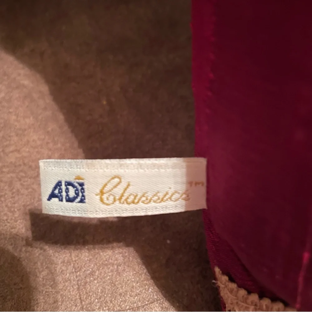 Decorative Pillow - 16”x16” - red (leaning a little burgundy) with gold trim